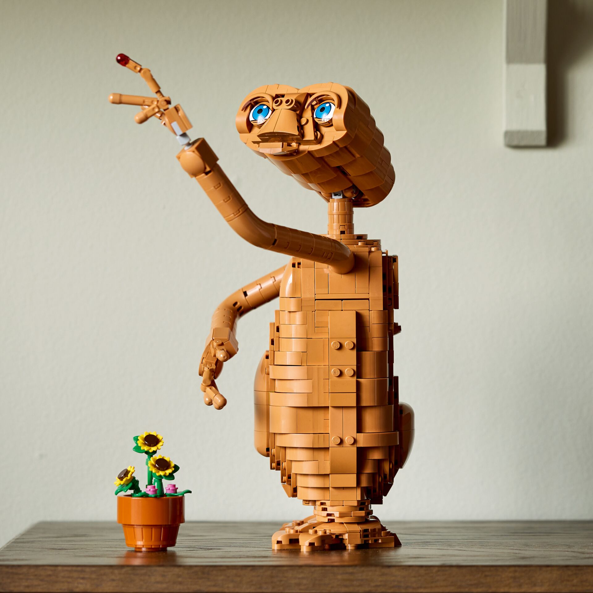 lego, brick sculpture, woodland creature, brown figure, sunflowers