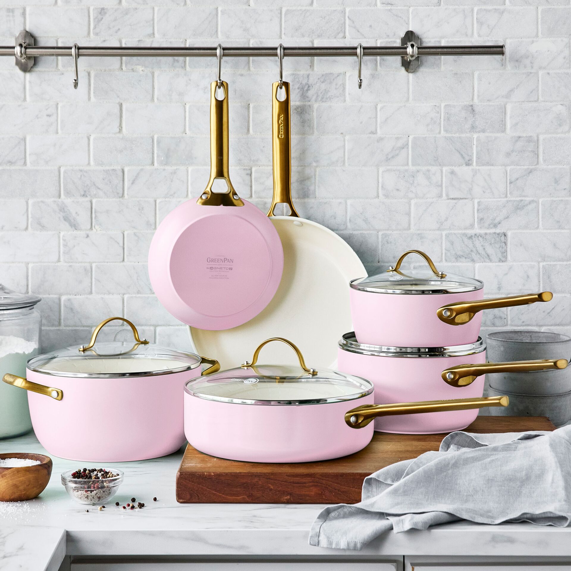 pink pots, nonstick, brick wall, gold handles, cookware set