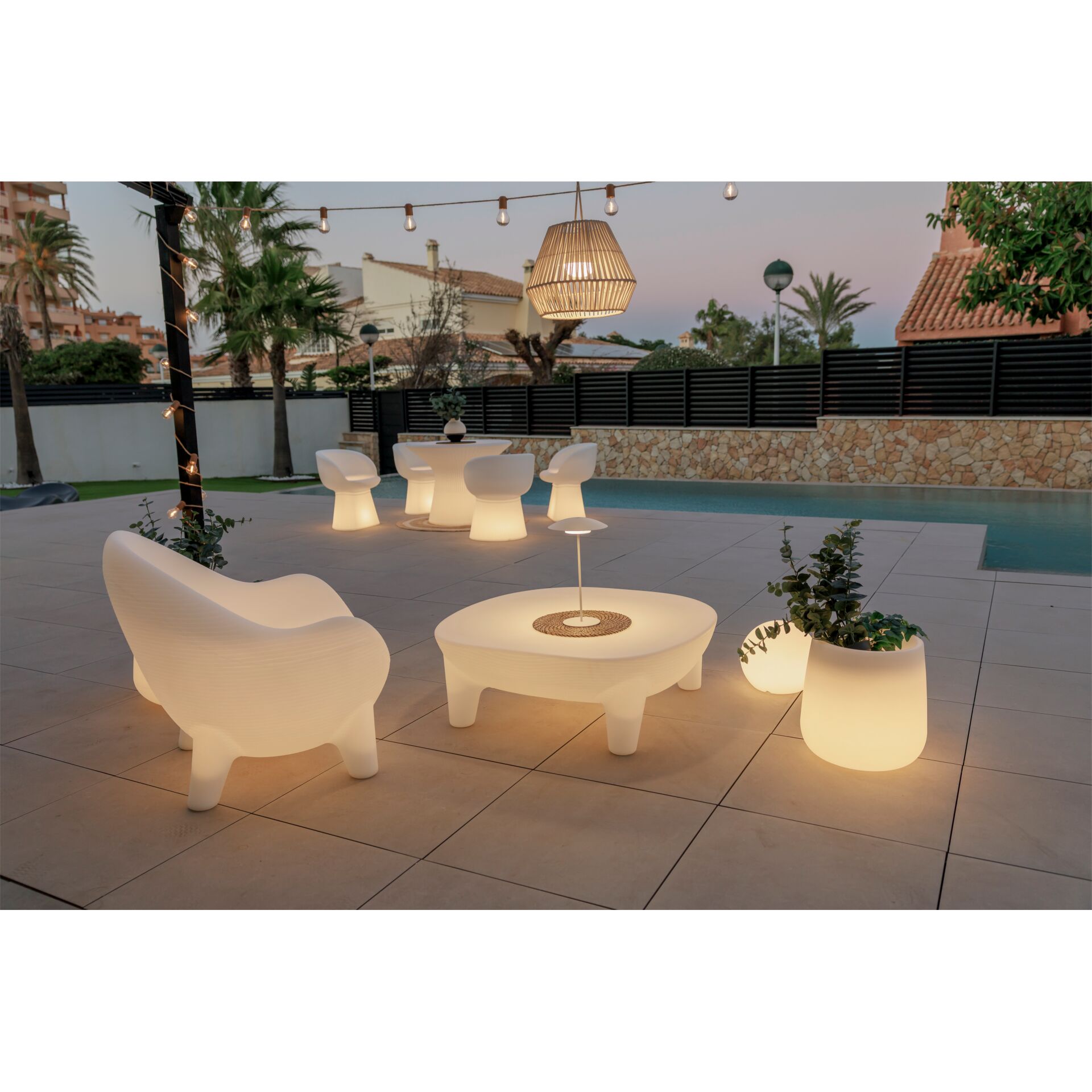 Outdoor furniture, Lounge set, Glow table, Stone patio, Poolside decor