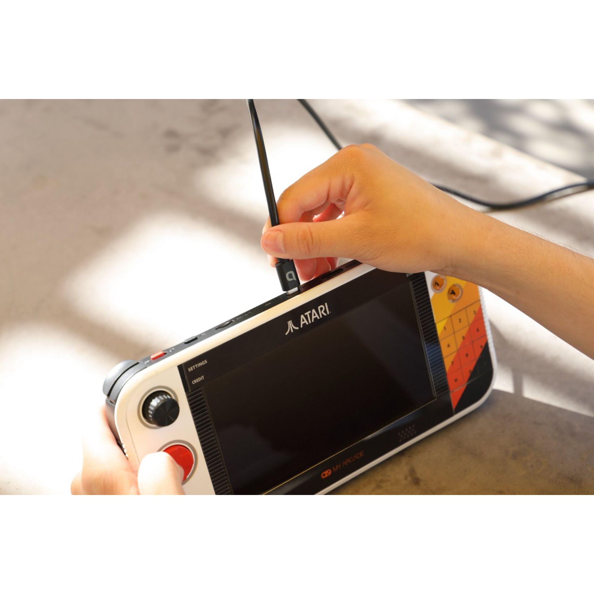 handheld console, handheld gaming, digital screen, stylus, Atari device