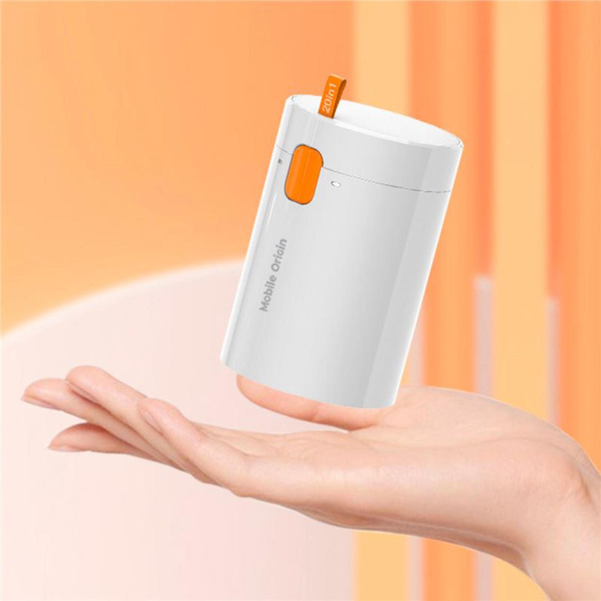 mobile power bank, portable charger, orange button, white device, handheld