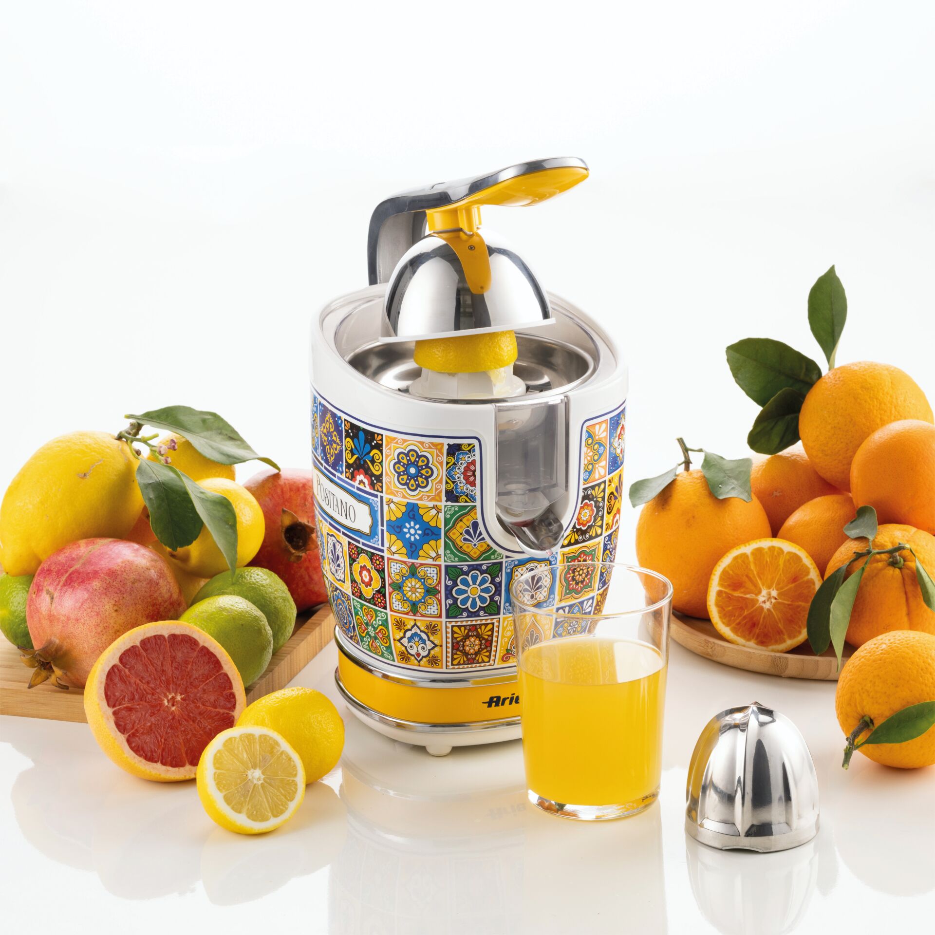 handheld juicer, orange juicer, stainless steel, ceramic tile pattern, fruit juicer