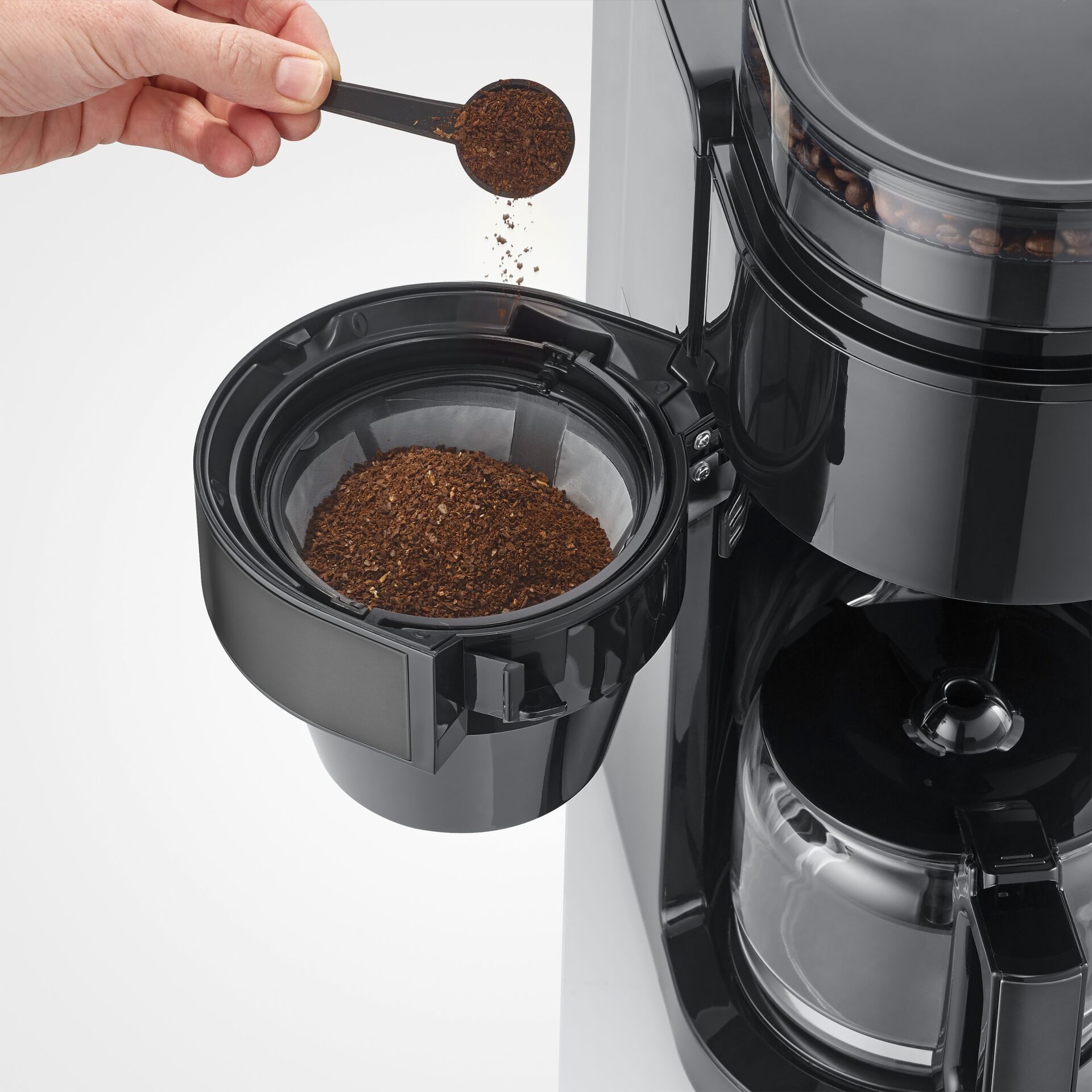 Kaffeemahlung, Kaffeezugabe, Kaffeemaschine, Kaffeebehälter, Bohnenbehälter