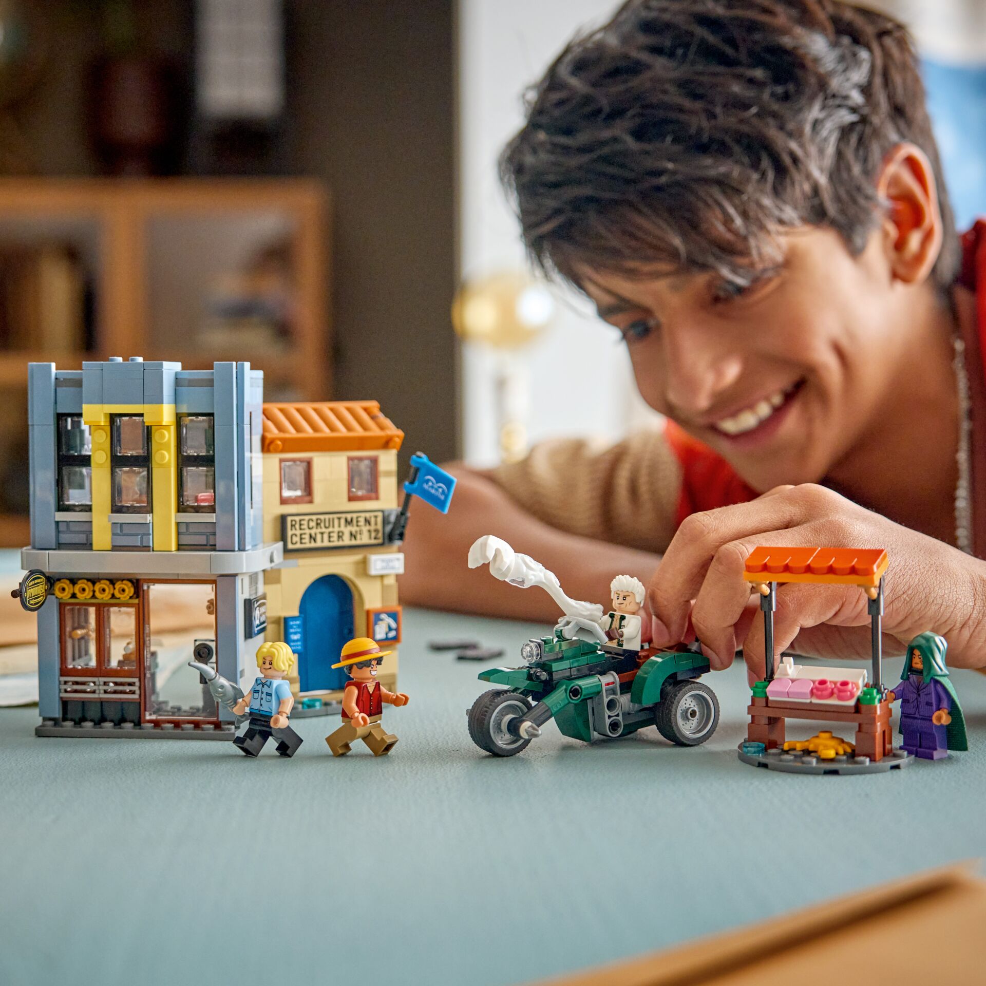 LEGO set, Minifigures, Bausteine, Ladenfassade, Motorrad